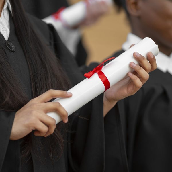 close-up-graduate-students-with-gown